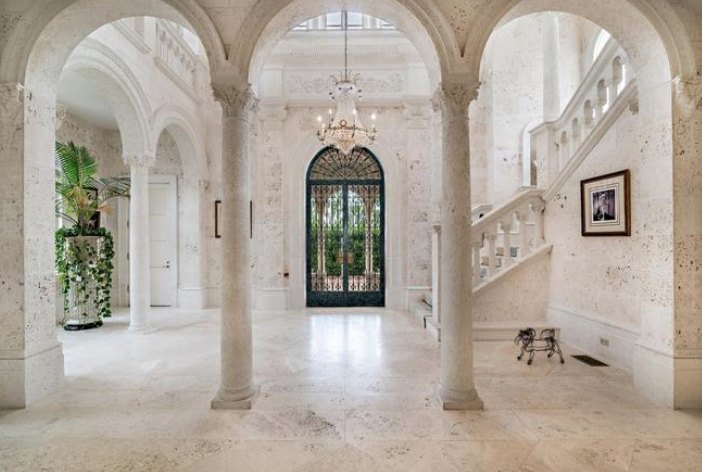Roman style arcades are featured throughout the La Follia estate. (Photo by Giles Bradford, courtesy Douglas Elliman Real Estate)