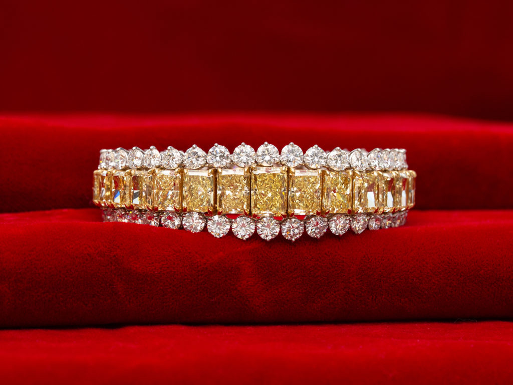 Important fancy intense yellow and white diamond bracelet