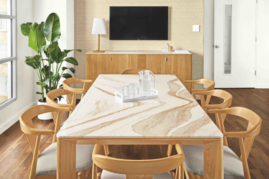 Room & Board’s new Pren collection with Cambria includes tables with natural quartz tops.