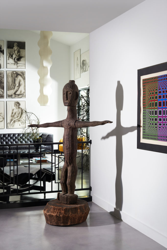 African artifact and Victor Vasarely print from Benny Jack Antiques. (Photo by Lisa Petrole)
