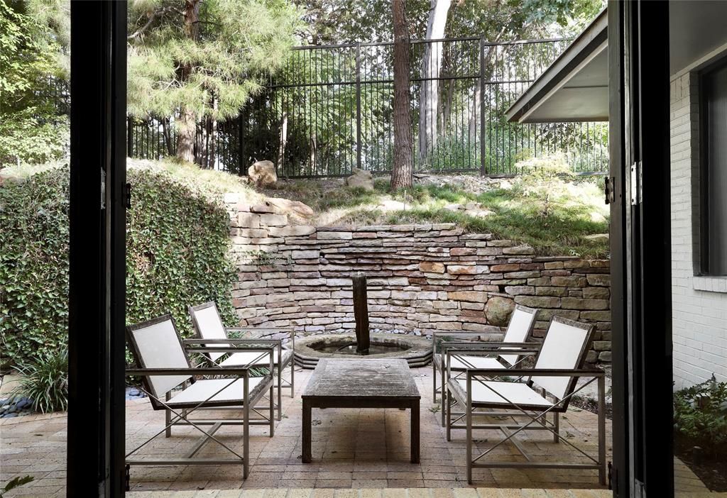 The architecturally significant 3832 Turtle Creek Drive is found on one of the most beautiful streets in Dallas. (Photo by Compass Real Estate )