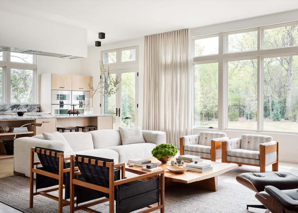 In the living room, Design Within Reach sofa. Vintage Cedric Hartman floor lamps from Vinya. Pair of vintage black-leather chairs belonged to Chad Dorsey’s uncle. Drapery fabric is Mokum New Zealand linen from Holly Hunt. (Photo by Stephen Karlisch)