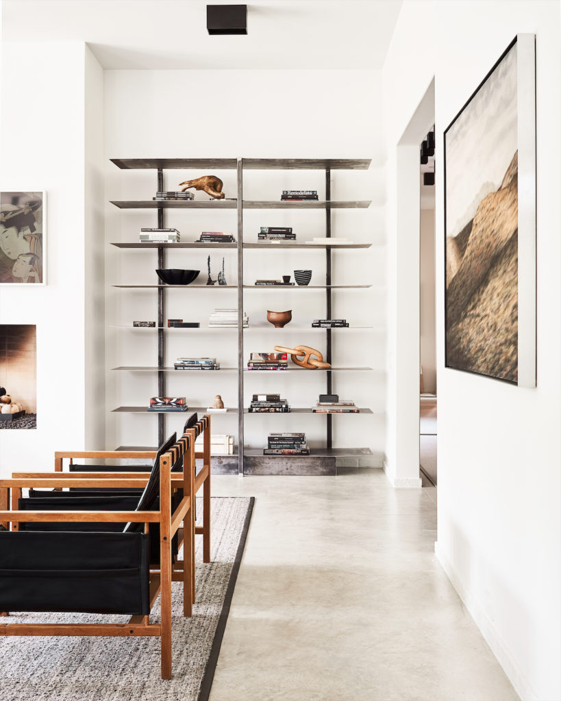 Dorsey designed the thin raw-steel shelving, which holds his collection of vessels. Reinhard Ziegler photograph from Conduit Gallery. (Photo by Stephen Karlisch)