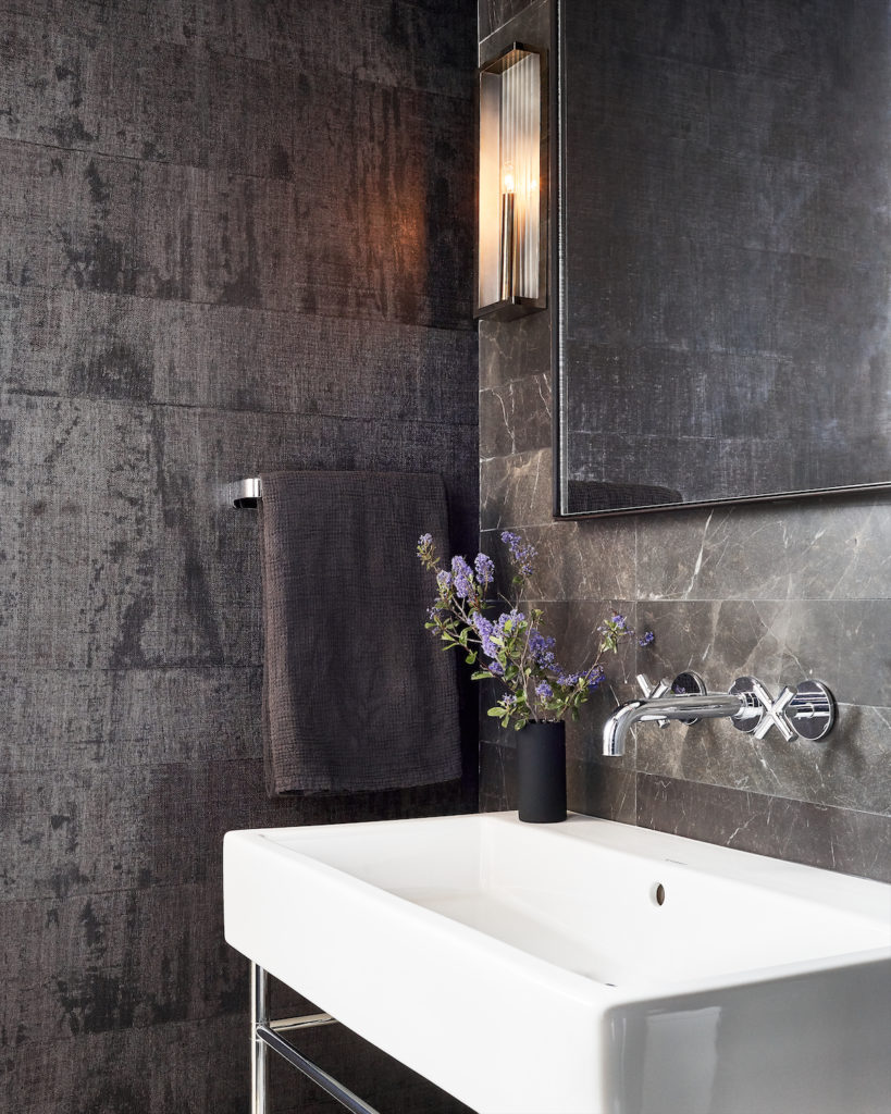 In the powder room, Duravit sink, Waterworks fixtures. (Photo by Stephen Karlisch)