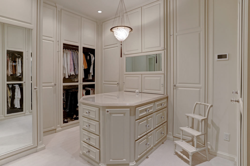 Reminiscent of closets in suites of elegant hotels in Paris, this one is at 8830 Stable Crest, listed by Lisa Kornhauser.