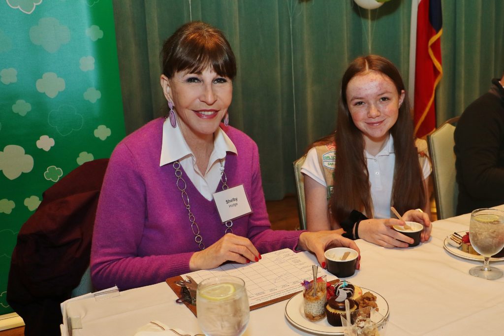 Shelby Hodge and Girl Scout Lilly Raab at the Girl Scout Cookie dessert contest, held at the Junior League of Houston.