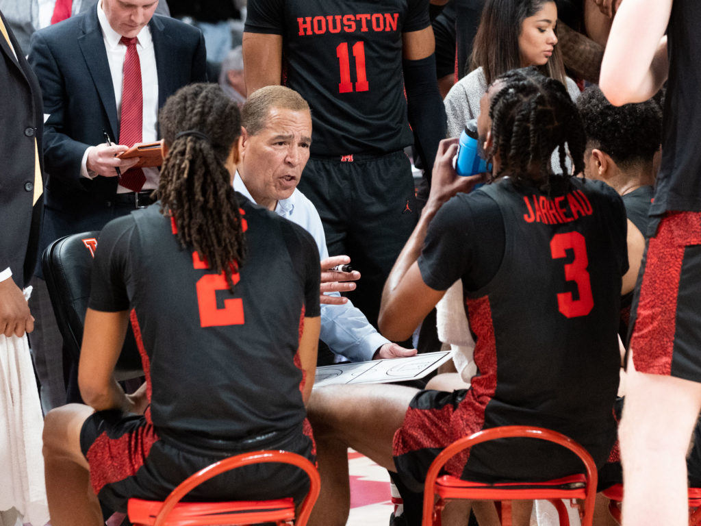 University of Houston coach Kelvin Sampson commands the huddle. (Photo by F. Carter Smith)