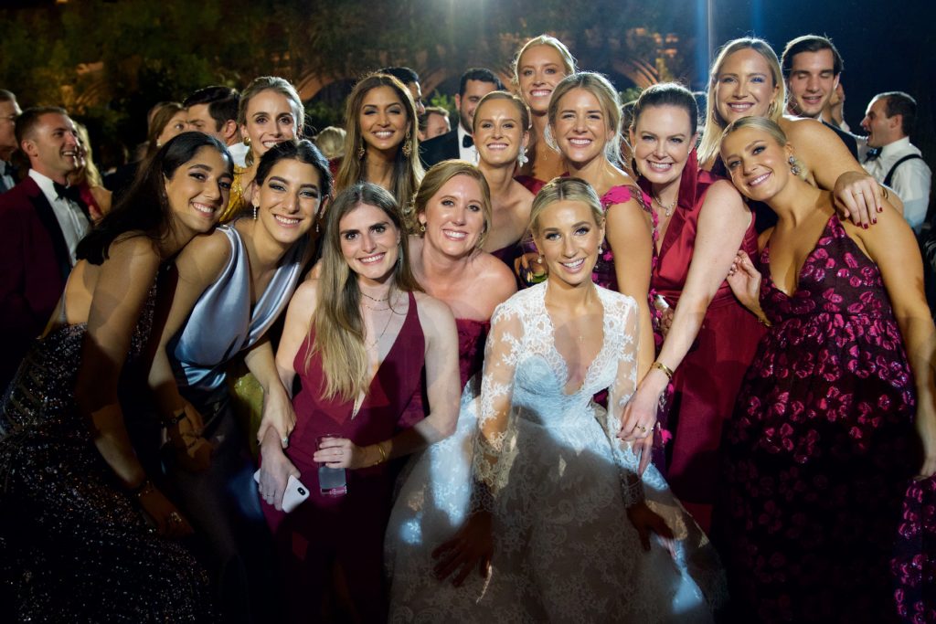Dagney Gómez del Campo Neme is surrounded by friends during her wedding in Mexico City. (Photo by Graciela Ubando)