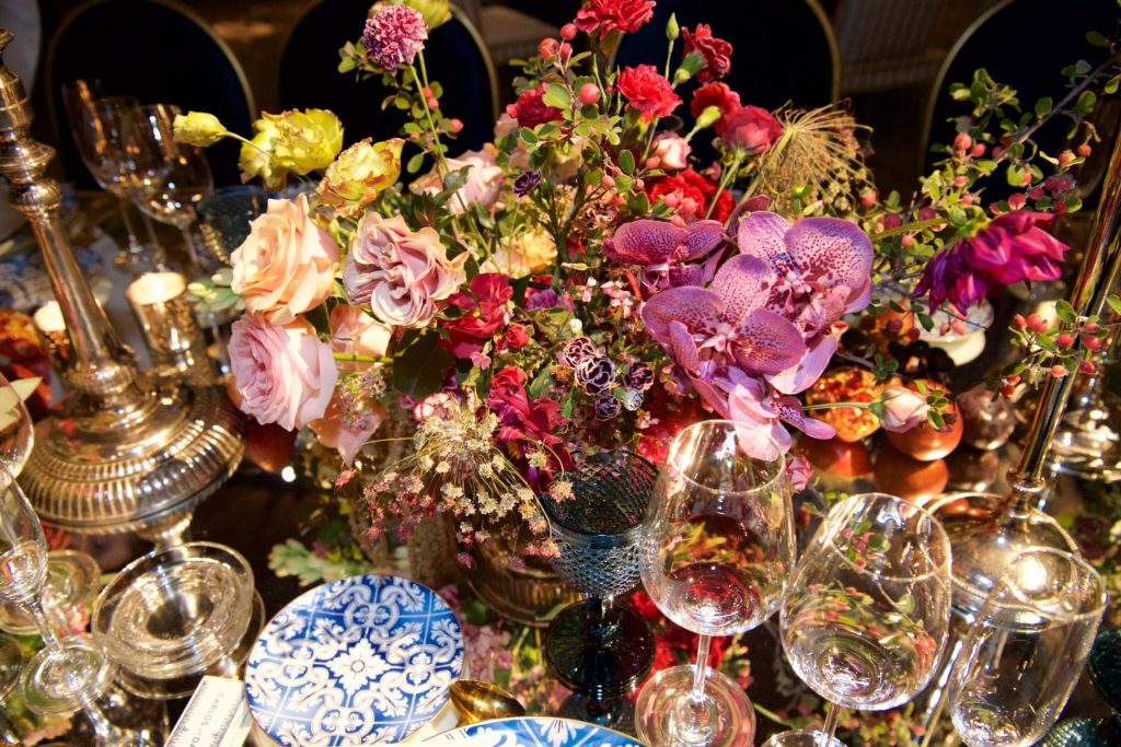 Tabletop flowers at the Pruner-Gómez del Campo Neme wedding reception.  (Photo by Graciela Ubando)