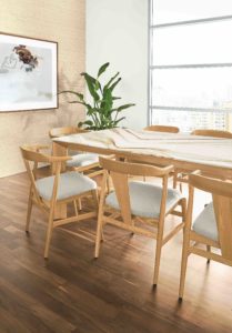 Room & Board’s new Pren collection with Cambria includes tables with natural quartz tops.