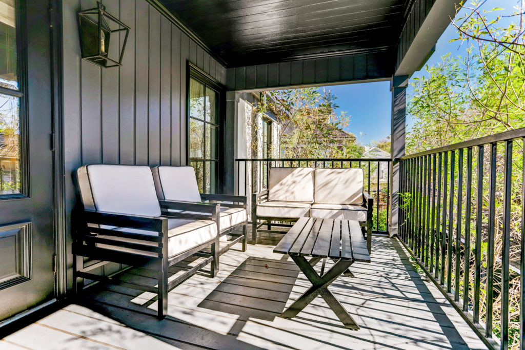 A second floor balcony provides vistas of the back yard and neighborhood. (Photo by TK Images)