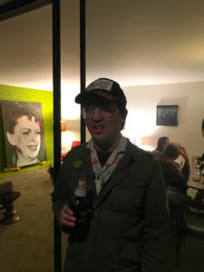 Artist/designer/friend/collector Peter Lee with Michael Bevilacqua’s “Judy, Judy, Judy,” 2018, on opening night.