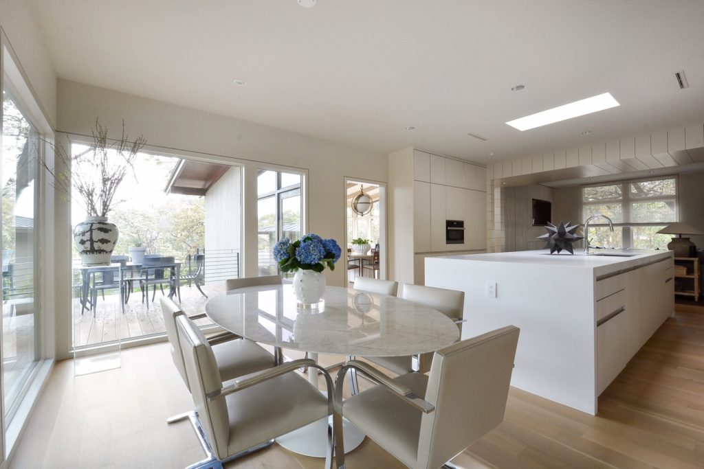 The informal dining area opens to the kitchen and outdoor terrace.