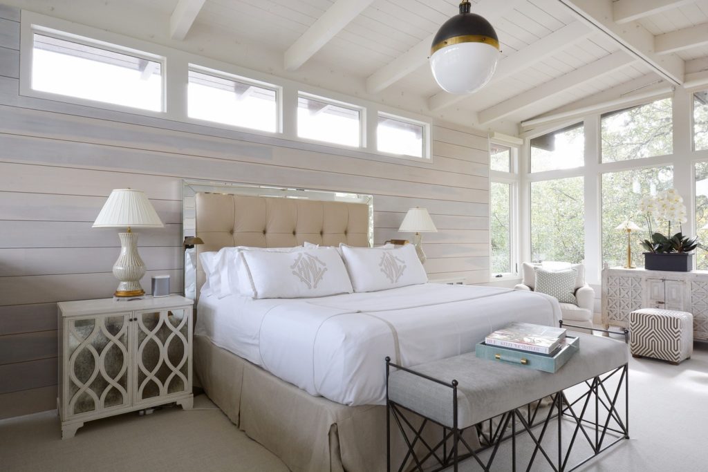 The third floor master bedroom has the feel of a luxe treehouse.