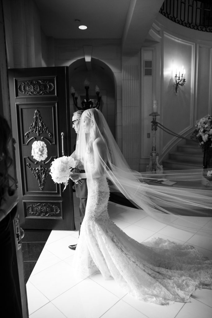 Krystal and her father, Bob Schlegel, heading down the aisle. (Photo by John Cain)