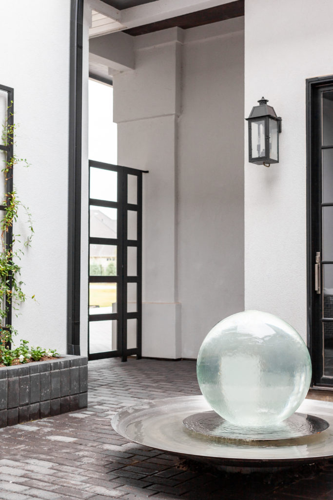 The home in Flower Mound, Texas, exudes the lavish approach to living found in luxury hotels such as the Four Seasons. (Photo by Jen Burner)