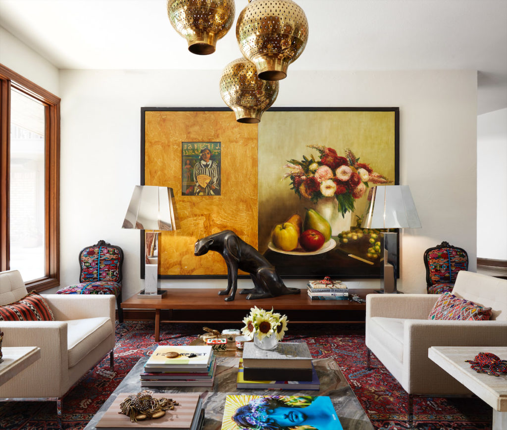A pair of '70s chrome Curtis Jere lamps, one of Judy Aldridge's first finds, and a large painting by David Bierk, purchased from a Marriott hotel. (Photo by Lisa Petrole)