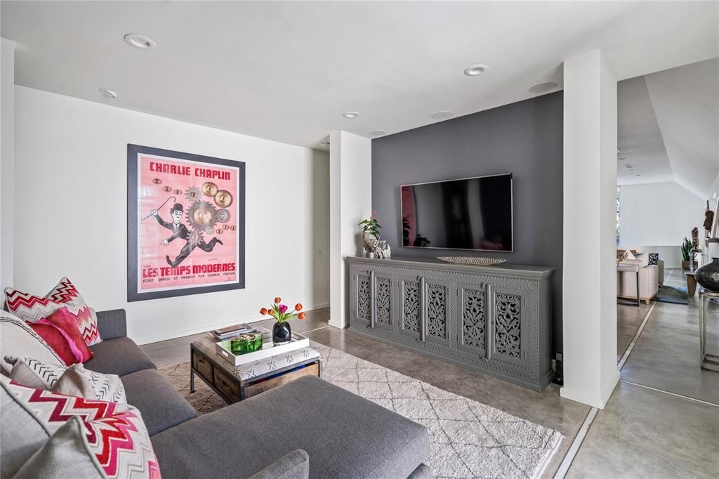 Custom concrete floors are found throughout the majority of the Ron Wommack-designed home. (Photo by Briggs Freeman Sotheby's)