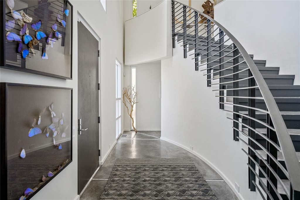 A streamlined stairwell. (Photo by Briggs Freeman Sotheby's)