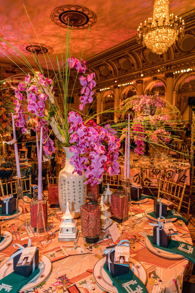 Naturally, everything was set beneath towering pink orchids. 