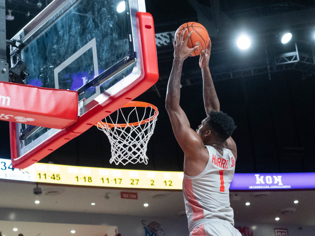 Chris Harris Jr. soars for an alley-oop slam. (Photo by F. Carter Smith)