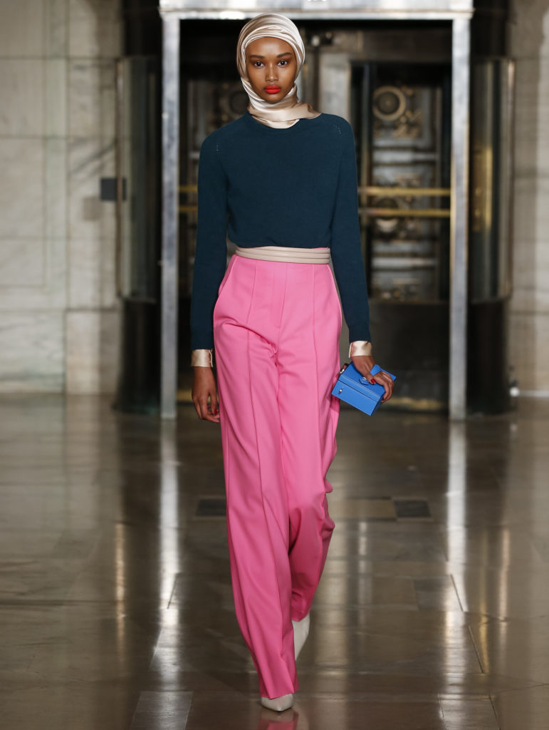 Oscar de la Renta cashmere crewneck sweater, tie neck silk blouse, stretch wool pant, ribbed leather belt. (Photo courtesy of Oscar de la Renta)
