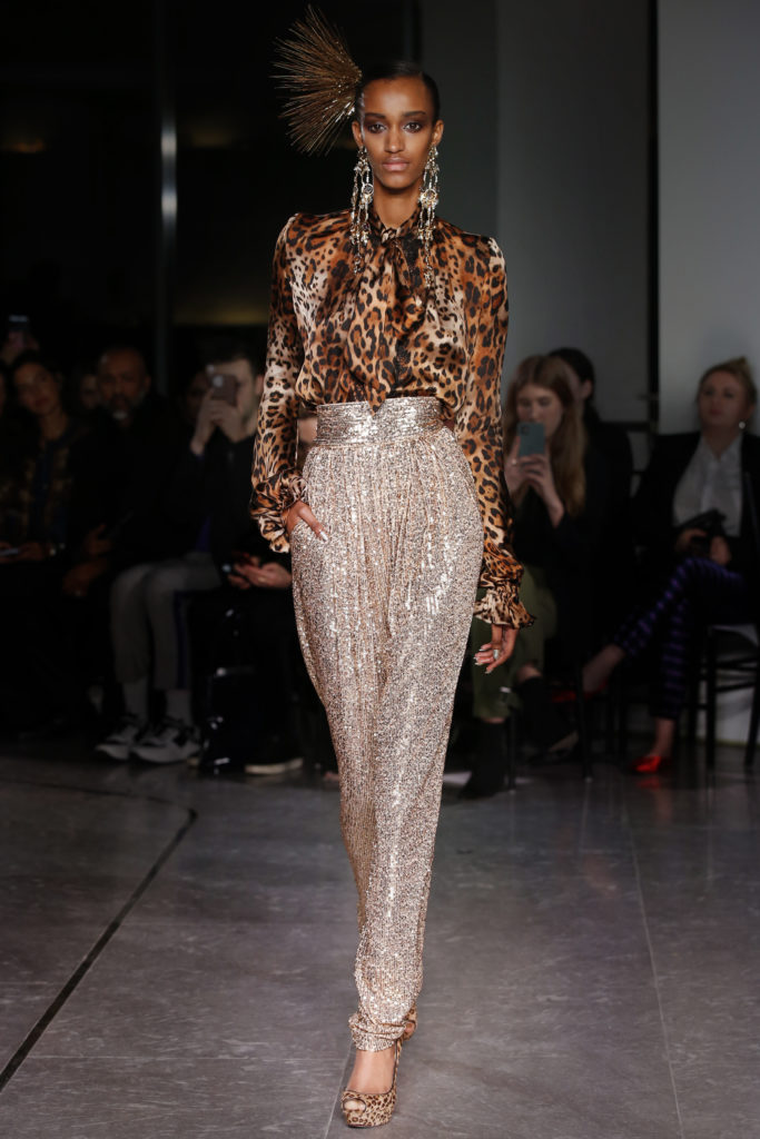 Naeem Khan animal print tie bow blouse and high-waist sequined harem pant. (Photo by Dan and Corina Lecca)