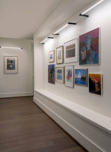 The gallery includes work by noted artists as well as pieces by Lynne Devine and her art-trained children. (Photo by Kerry Kirk)