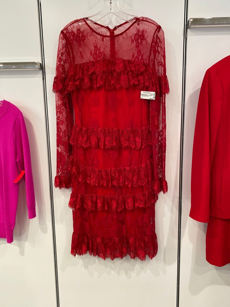 A fabulous red lace frock for $98 won't last long at the Blue Bird Circle Resale Shop. (Photo by Shelby Hodge)