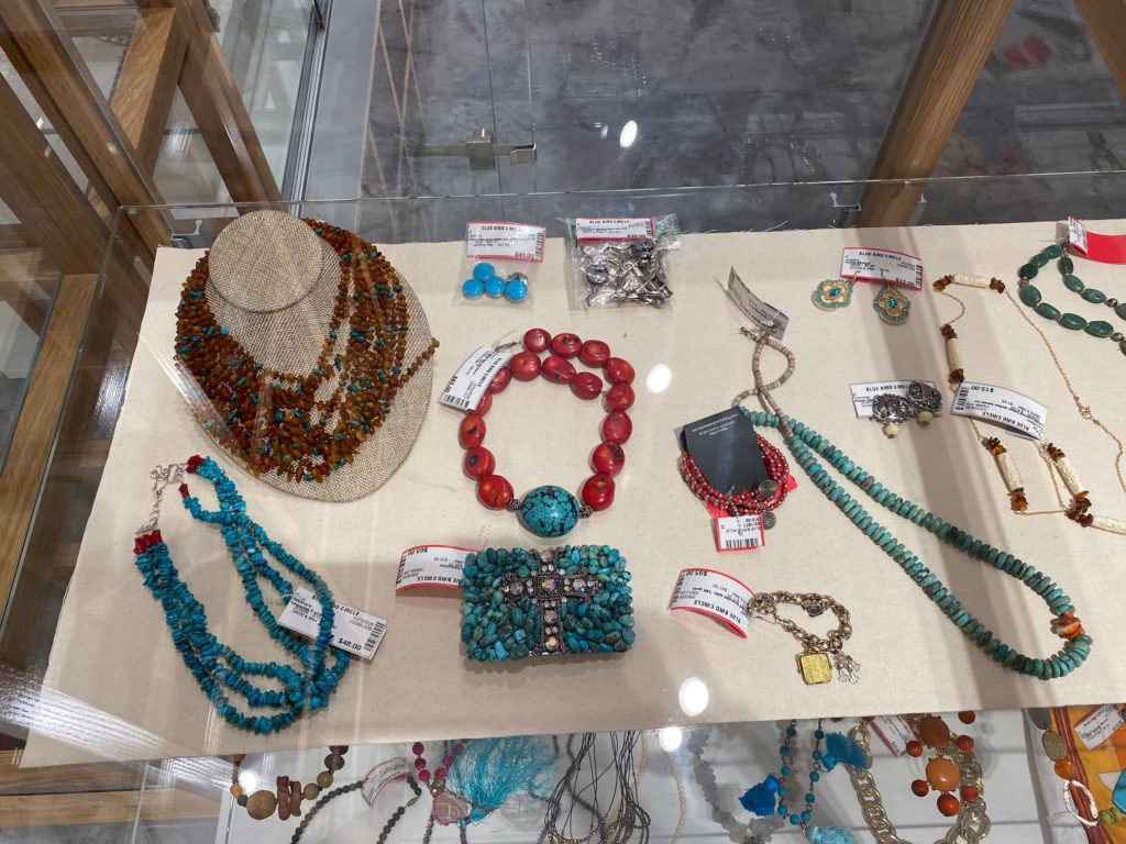 Turquoise and coral are among jewelry pieces on display at the Blue Bird Circle Resale Shop. (Photo by Shelby Hodge)