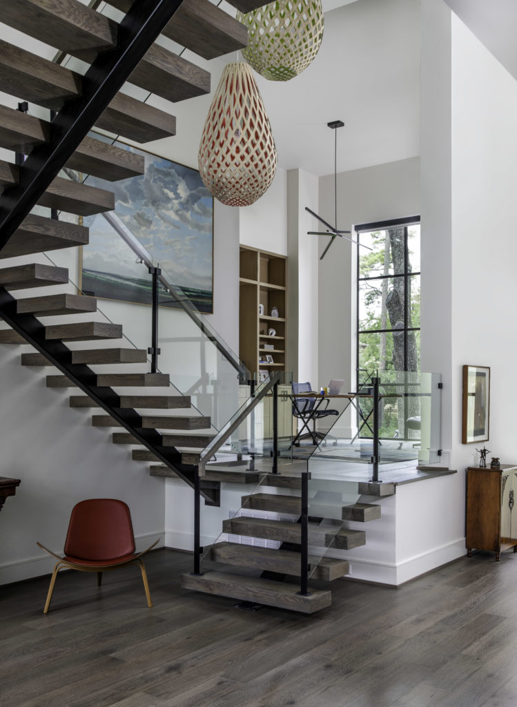 Frankel Building Group created this contemporary home with an interesting stair landing that serves as a home office. (Photo by Kerry Kirk)