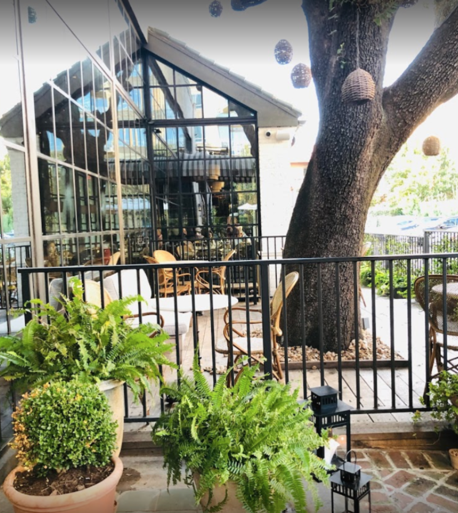 Massive oak trees set the stage at Emmaline for some enchanted evenings.