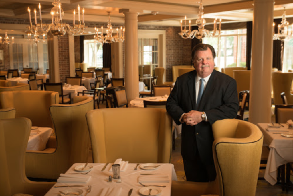 Alex Brennan-Martin's portrait is made along aside the comforting and oh-so-private, over-sized wingback chairs.