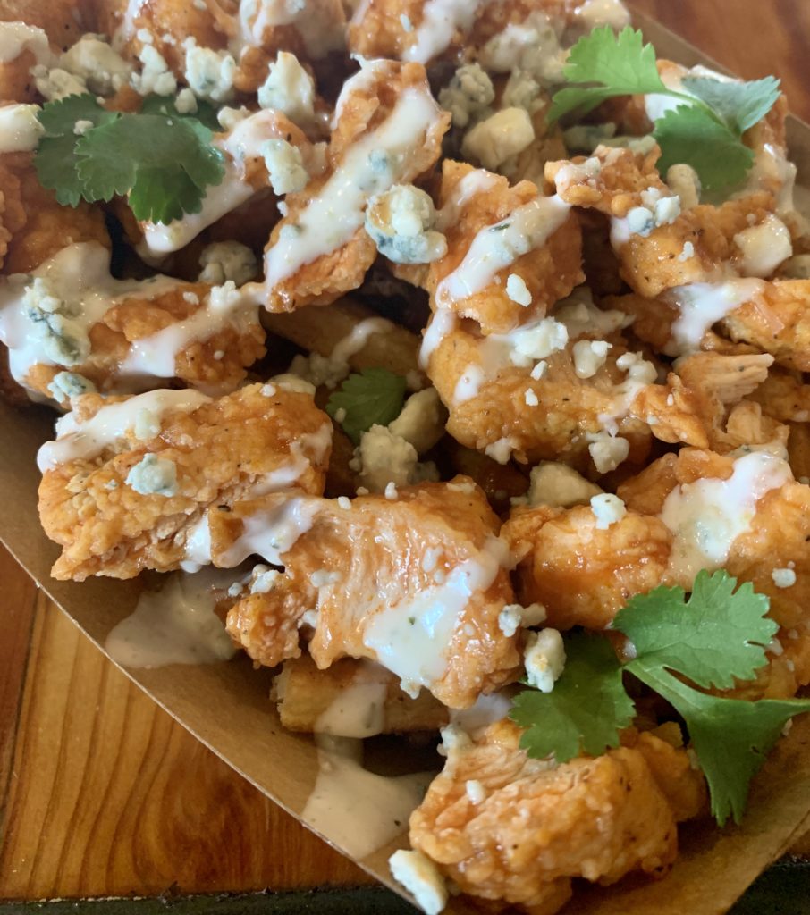 The Buffalo Chicken bites with jalepeno ranch and gorgonzola cheese. 