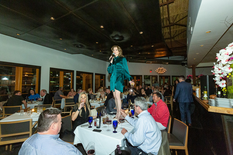 Wendy Dawson gets on a table top to toast Ibiza's 19 years of success.  (Photo by Tony Ruppe)