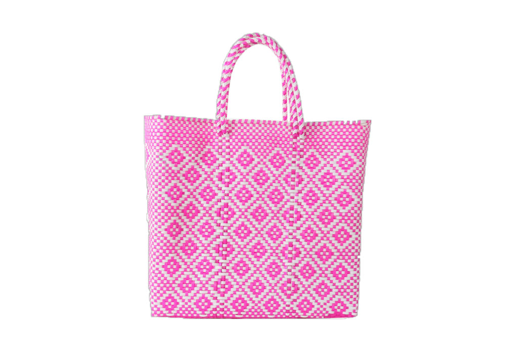 This waterproof, plastic woven bag, made by one of Mi Golondrina’s artisan community partners, is quite possibly the best beach tote in the game. It might even be the best tote in the game. We’ll stand by it.