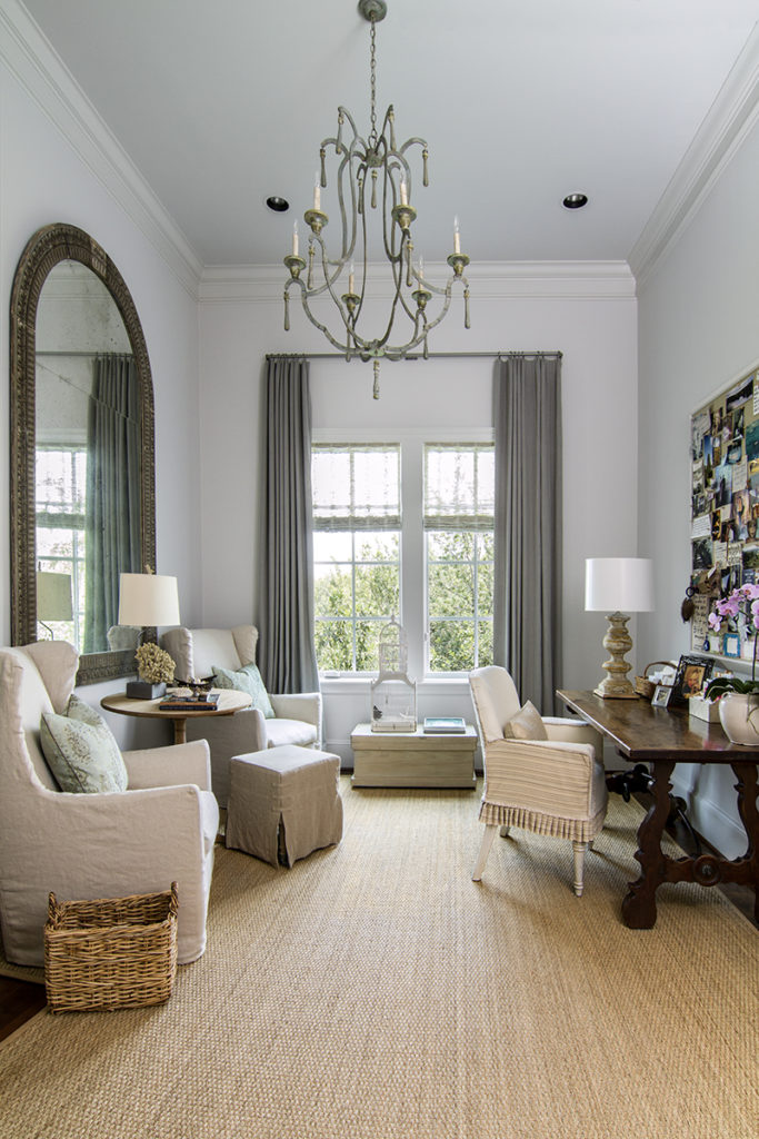 This cozy office, designed by Ginger Barber, was carved from a long and narrow space that proved ideal for this use. (Photo by Michael Hunter)