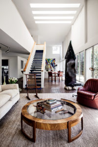 Table, circa 1950, from the Brochstein former family home in Braeswood. Antique woodworking tools, many of which belonged to Raymond’s father, Isaac Brochstein, who co-founded the family-owned firm in 1935. (Photo by Pär Bengtsson)