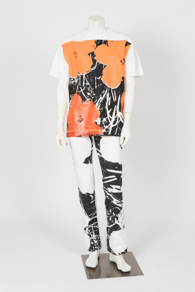 Drawing inspiration from Andy Warhol's iconic 1960s "Flowers" print, former Calvin Klein creative officer Raf Simons designed this printed cotton jersey and denim ensemble in 2017. 