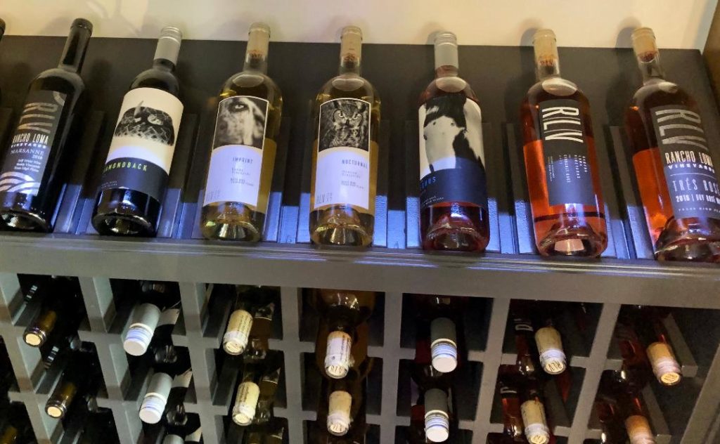 Racks of wine at Rancho Loma Vineyards. (Photo by Courtney Dabney).