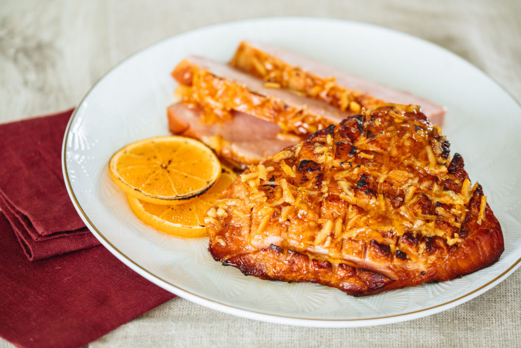 Order your Easter meal to-go, including this orange bourbon vanilla glazed ham. (Courtesy of Eatzi's)