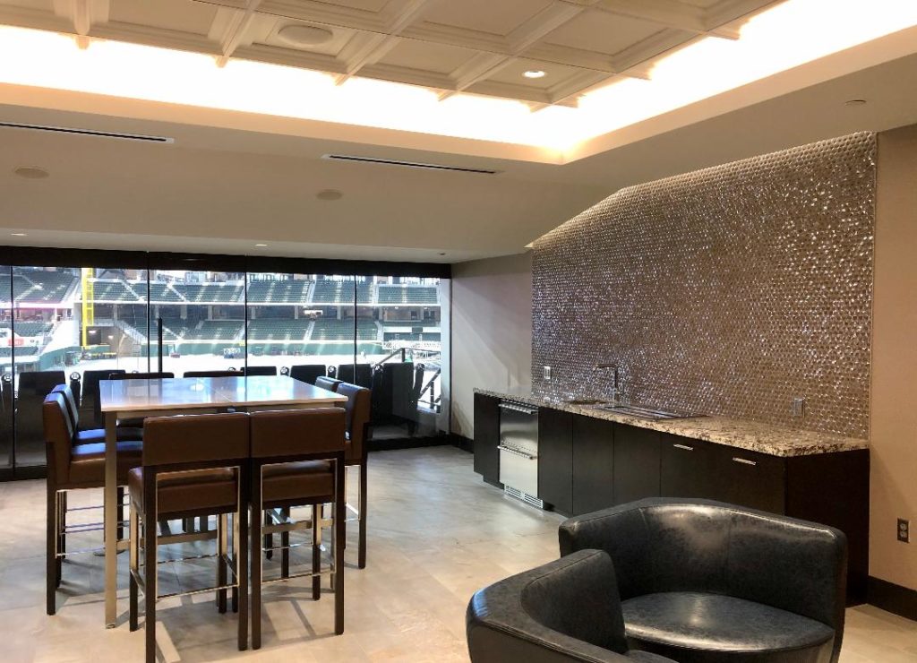 Theater seating just outside the Founder's Suite with a view of field. (Photo by Courtney Dabney)