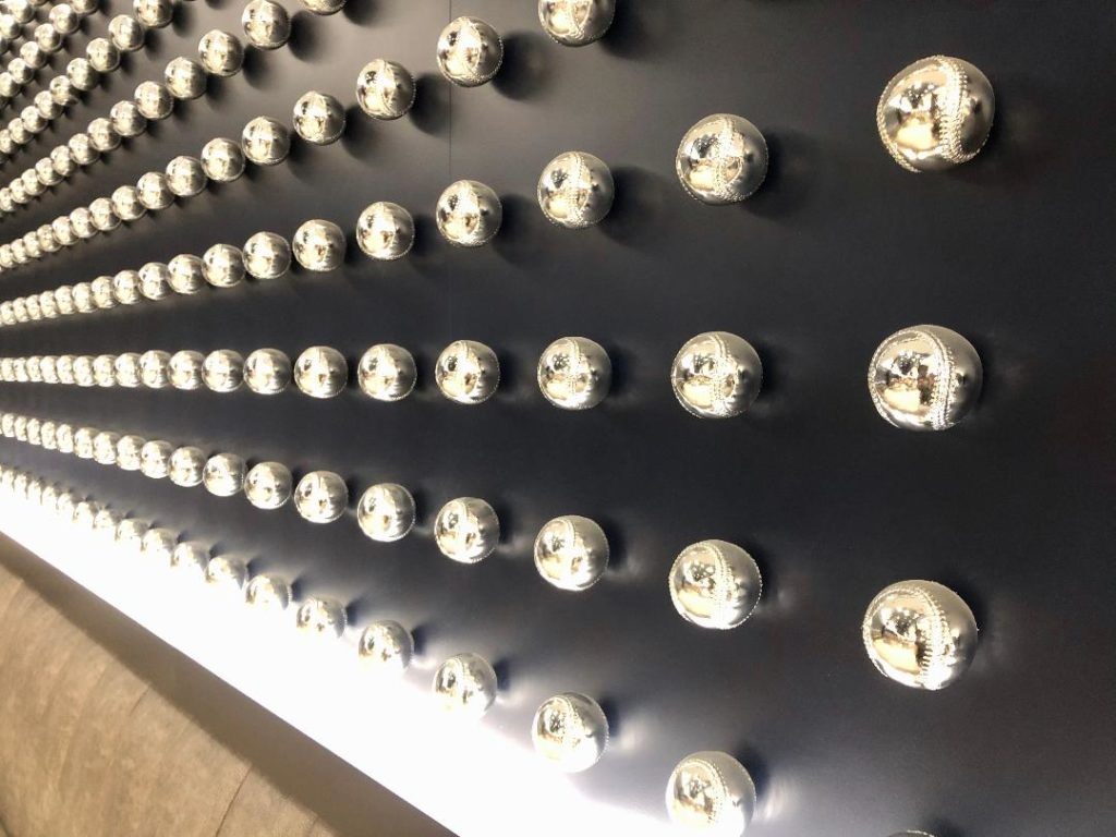 Silvered baseballs make a striking backdrop inside the Stub Hub Club. (Photo by Courtney Dabney)