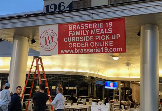The new normal as Brasserie 19 in River Oaks Shopping Center promotes its curbside service. (Photo by Shelby Hodge)