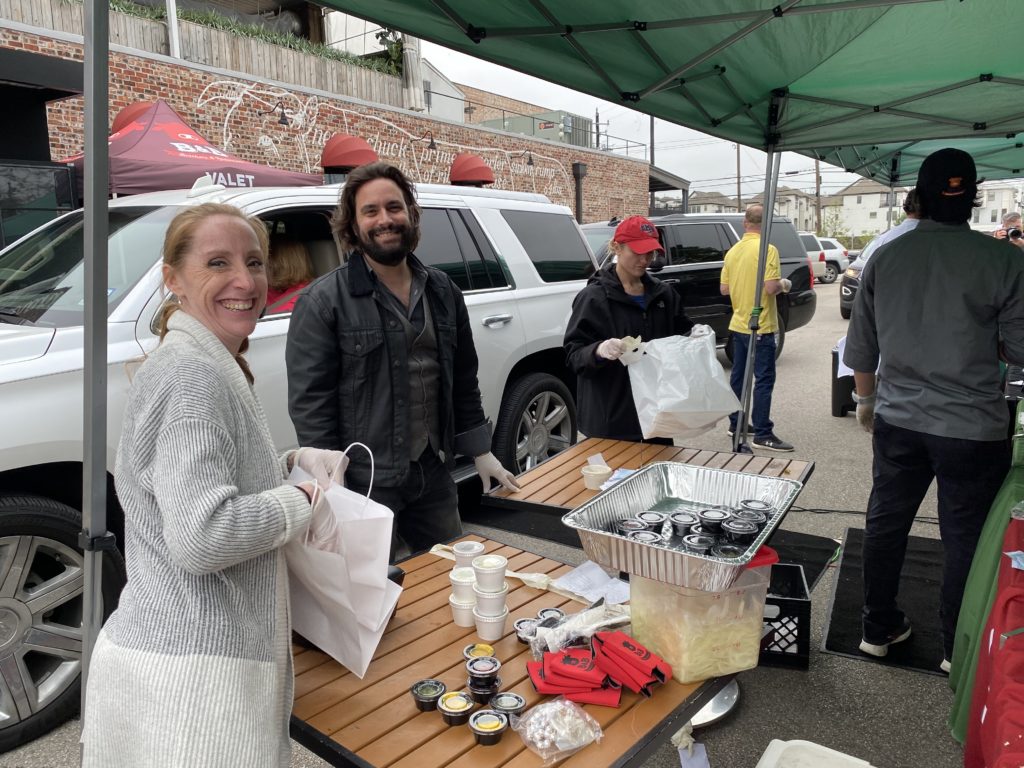 All hands on deck: Kim Stitham and Sam Governale for Berg Hospitality's Drive Through Barbecue fundraiser at B&B Butchers on Washington Avenue. (Photo by Shelby Hodge)