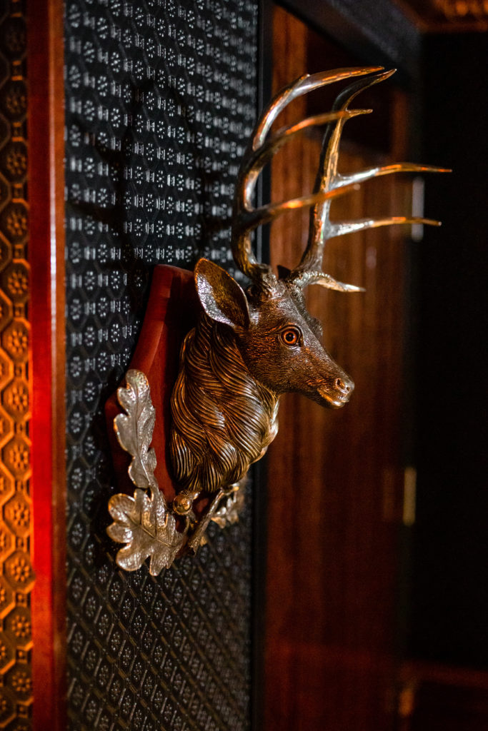 A decorative deer head on the bar wall. (Photo by Kirsten Gilliam) 