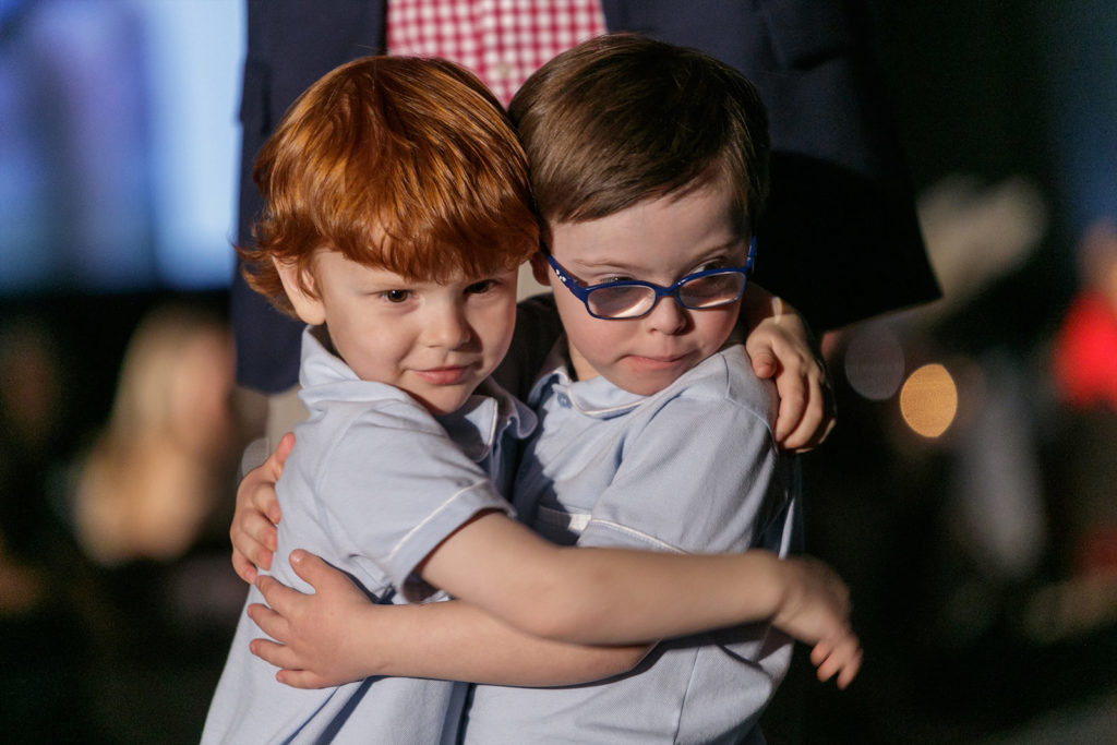 Brothers modeling at the third annual Runway for Rise at the Ritz-Carlton. 