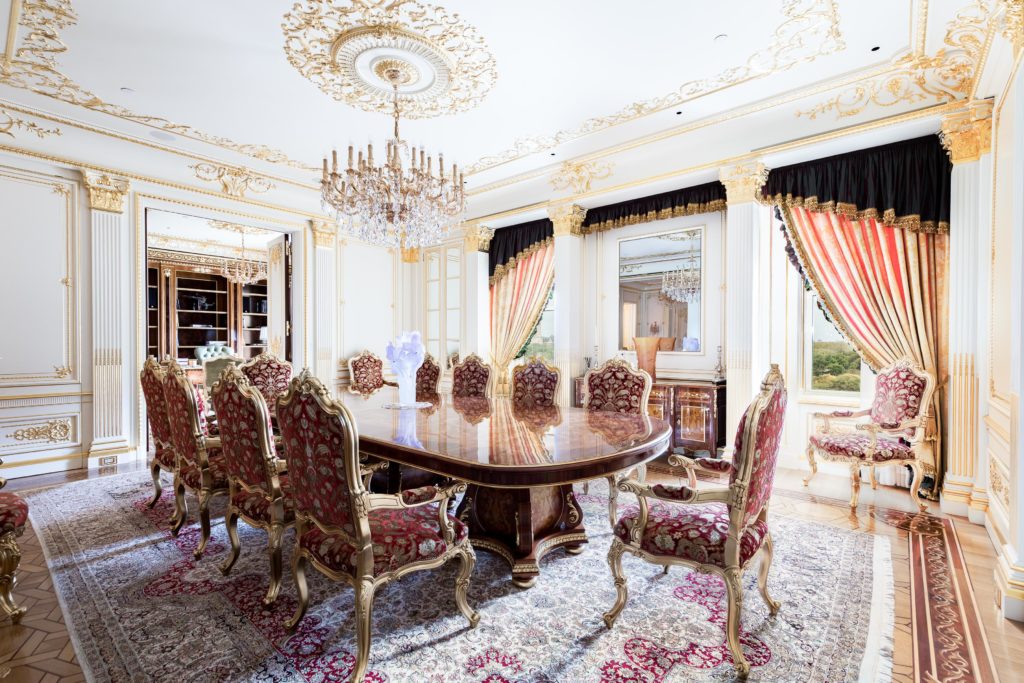 The lavishly appointed dining room overlooks Central Park South. (Photo courtesy Douglas Elliman )