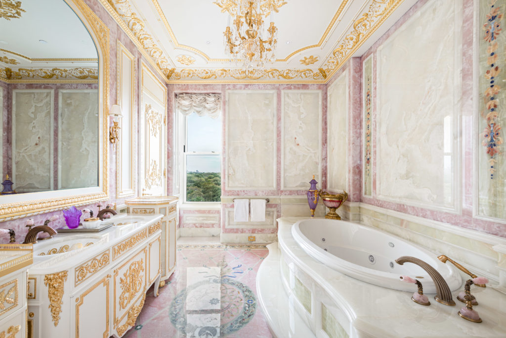 The master bath is paneled floor to ceiling in imported onyx.  (Photo courtesy Douglas Elliman )