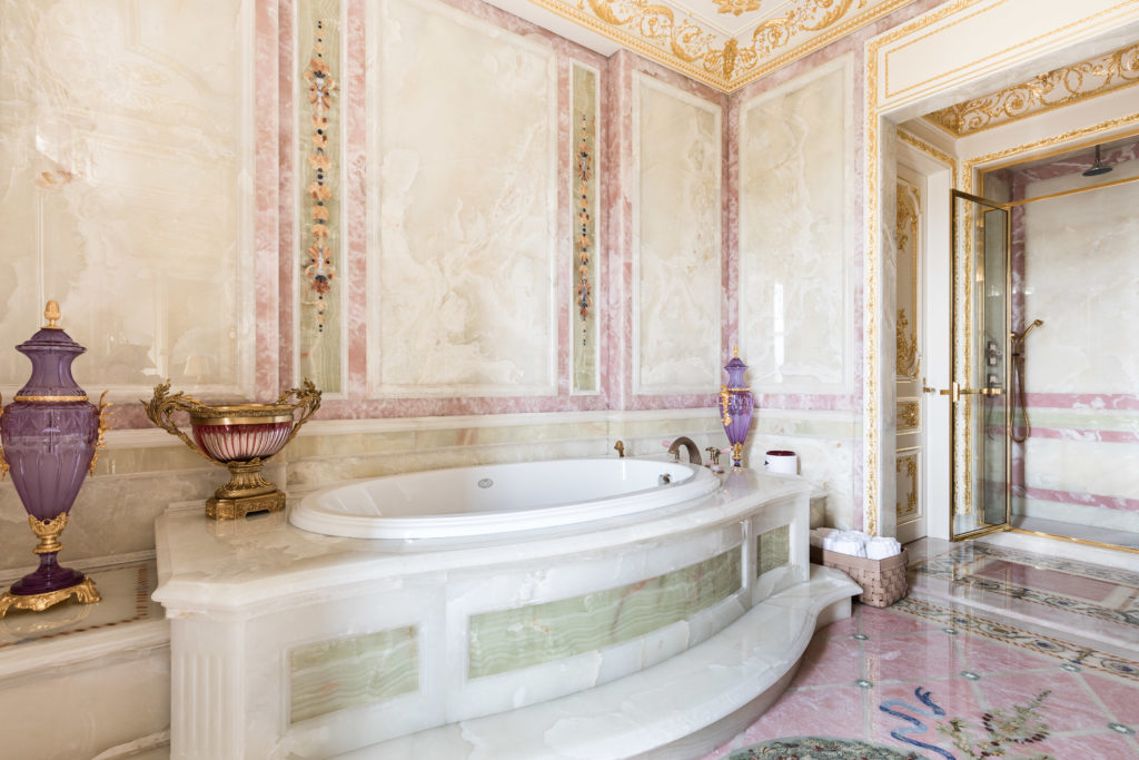 Another view of the master bath which is paneled floor to ceiling in imported onyx.  (Photo courtesy Douglas Elliman )